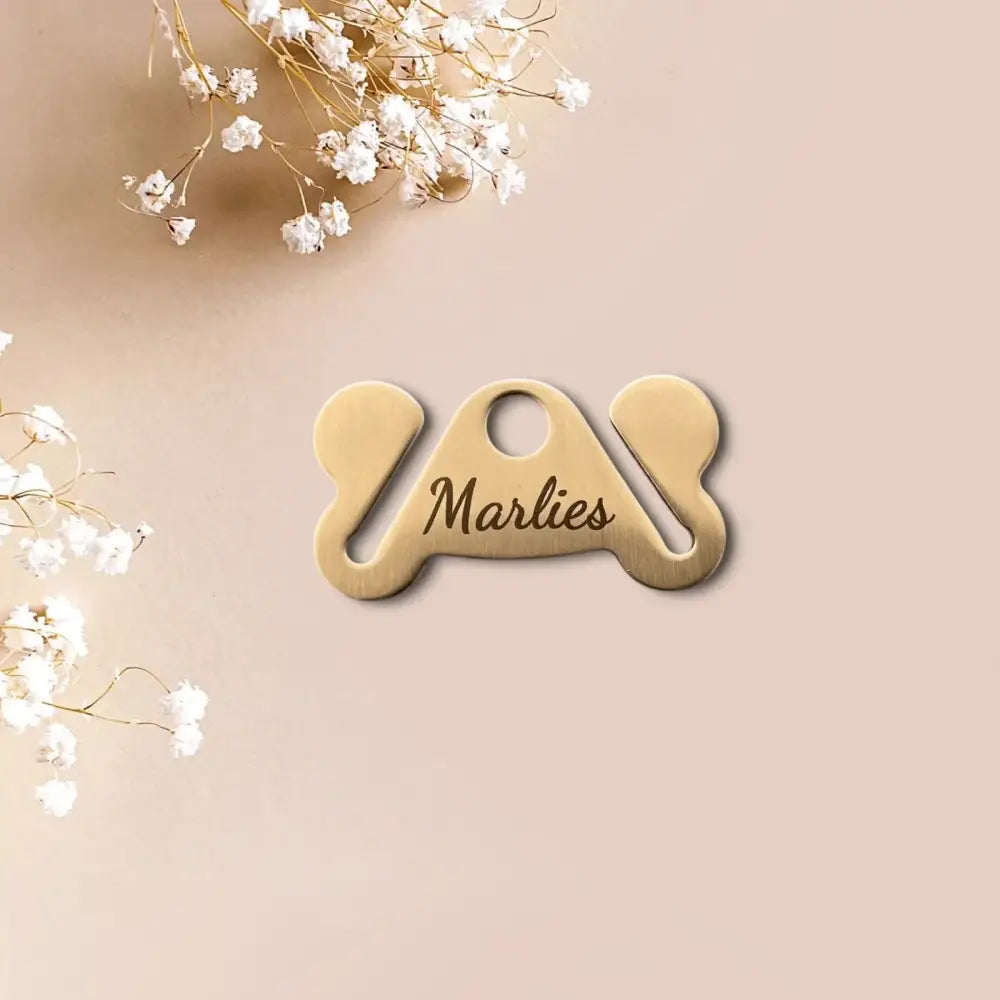 Beige bra strap clip für Edelstahl Hundekotbeutelhalter in Knochenform, perfekt für Hundehalsband