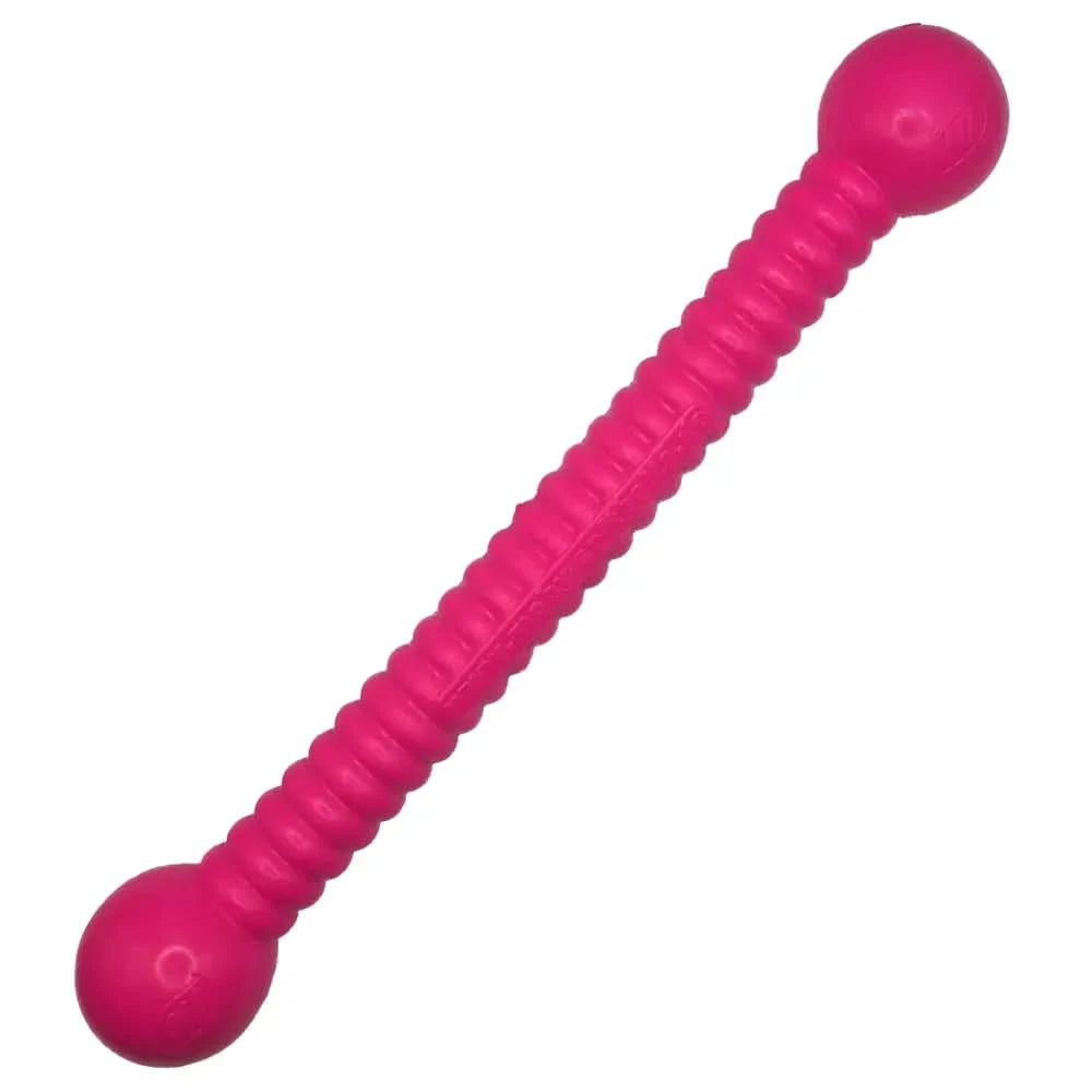Vibranter pinker moby dog stick aus robustem kunststoff mit geripptem körper und glatten enden zum spielen für deinen hund