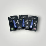 Drei verpackte blaue Acme-Alpha-Pfeifen.