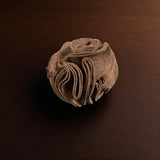 Beige felted wool flower on grosser schnueffelball sherlock for pets