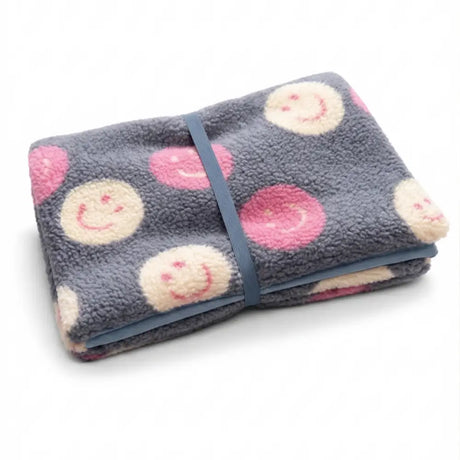 Hundedecke smiley to go kompakt faltbar graue fleece hundedecke mit rosa und cremefarbenen lächelnden gesichtern
