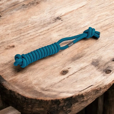 Knotted teal rope toy for dogs from Treusinn Tau-Spielzeug SPIELY with robust design