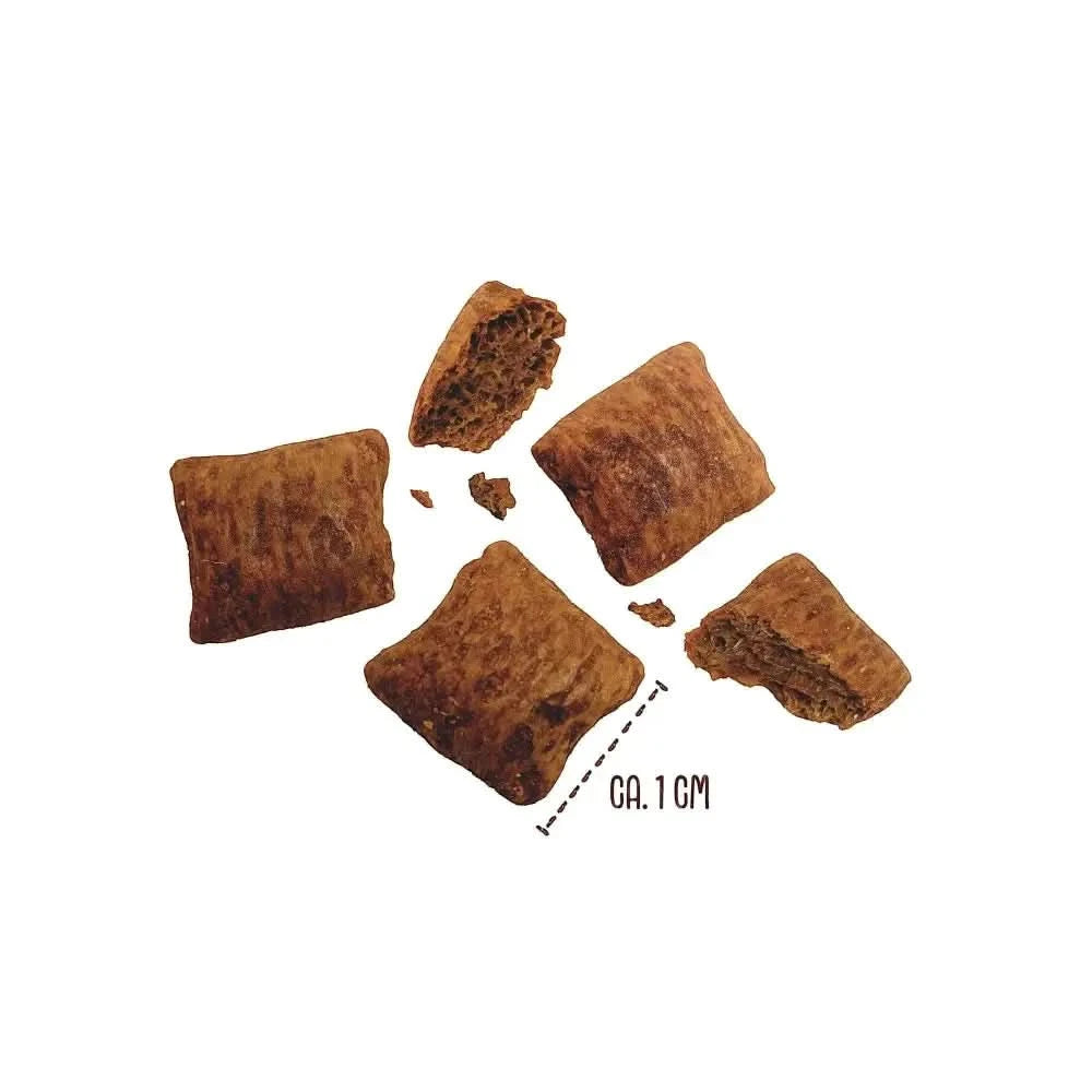 Braune, quadratische vegdog puppy brainy bites hundesnacks mit krümeliger textur und hypoallergener rezeptur