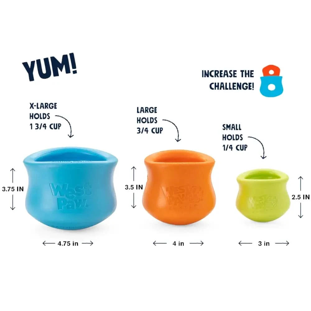 Drei robuste futterpuzzle von west paw toppl aus buntem silikon in blau orange und grün als interaktives hundespielzeug